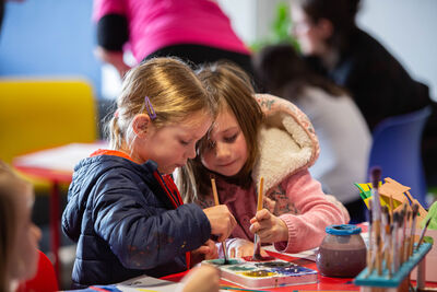 Two children painting in Create Space