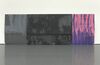 An oversized manilla document folder, which has been scaled up to be the same size as a person. It is painted grey, pink and purple. From Scott Myles' exhibition in 2012.