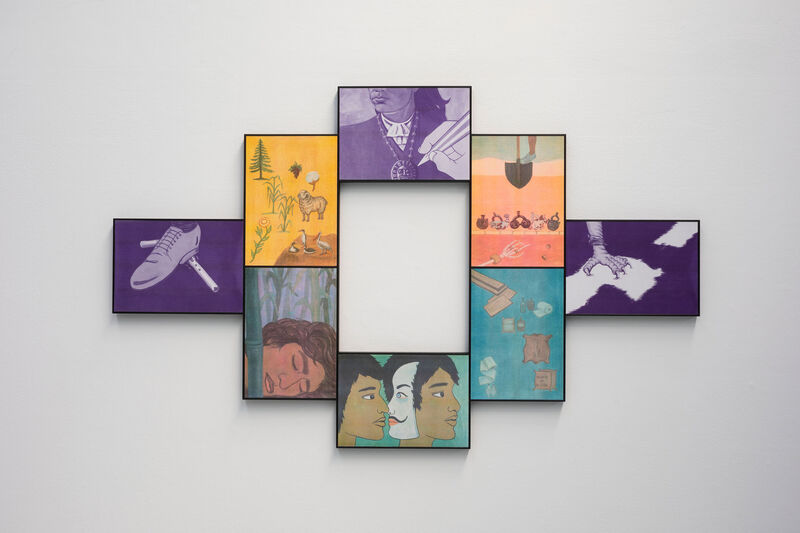 Coloured images hung in a wreath like configuration on a gallery wall