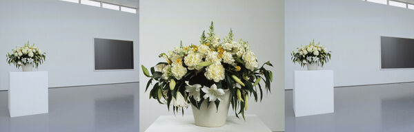 Images from Marine Hugonnier's exhibition at DCA. The central image is a large white pot of drooping yellow roses and lilies. In the other images, the flowers can be seen from a distance on a white stand, and there is a black canvas in the background.