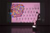 DCA Galleries during Trisha Baga's exhibition. A projections screen shows a pink background with red, yellow and blue swirls on top. A small statue of a woman sits in front of the projection.