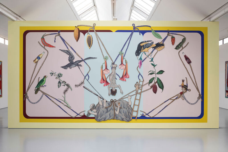 A large mural in a gallery with images of flowers, a person hanging upside down and birds
