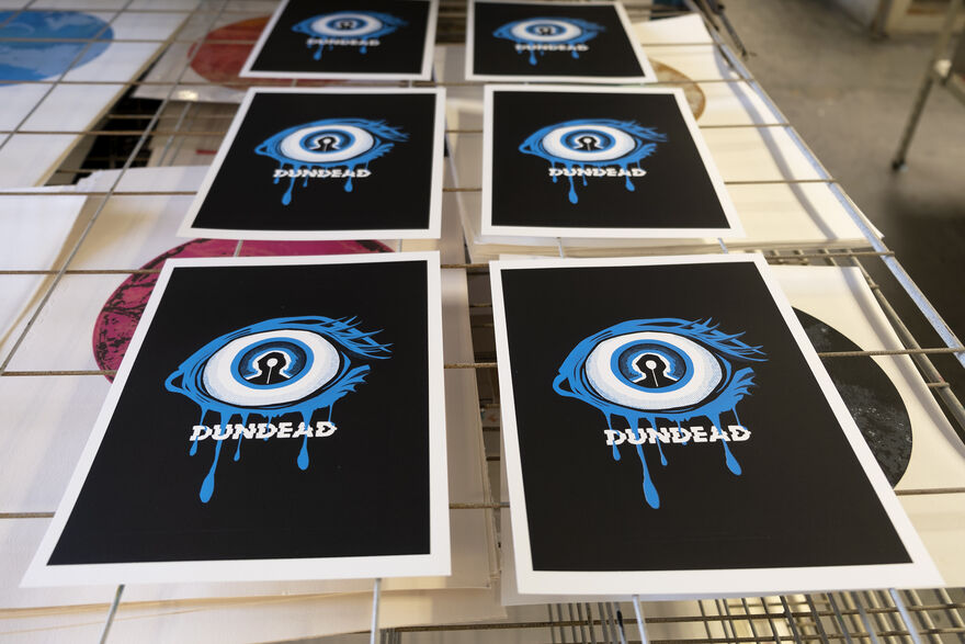 Dundead screenprints featuring an eye in blue