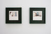 A photograph of two square framed artworks.
