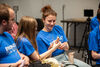 A young person in a blue Discovery Film Festival t-shirt.